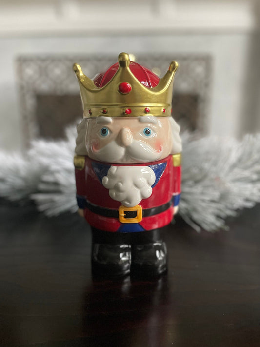 10”h x 6” w. Nutcracker dolomite cookie jar.