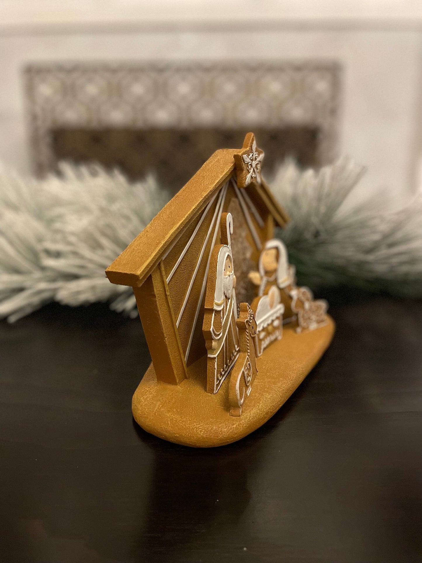 7.5”H x 8”L x 4”W. Nativity Gingerbread lighted. Manger scene.