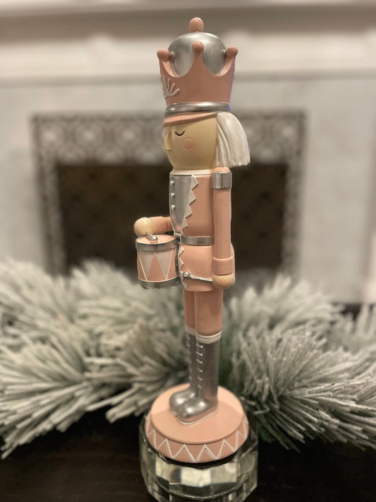14” Resin nutcracker with drum.