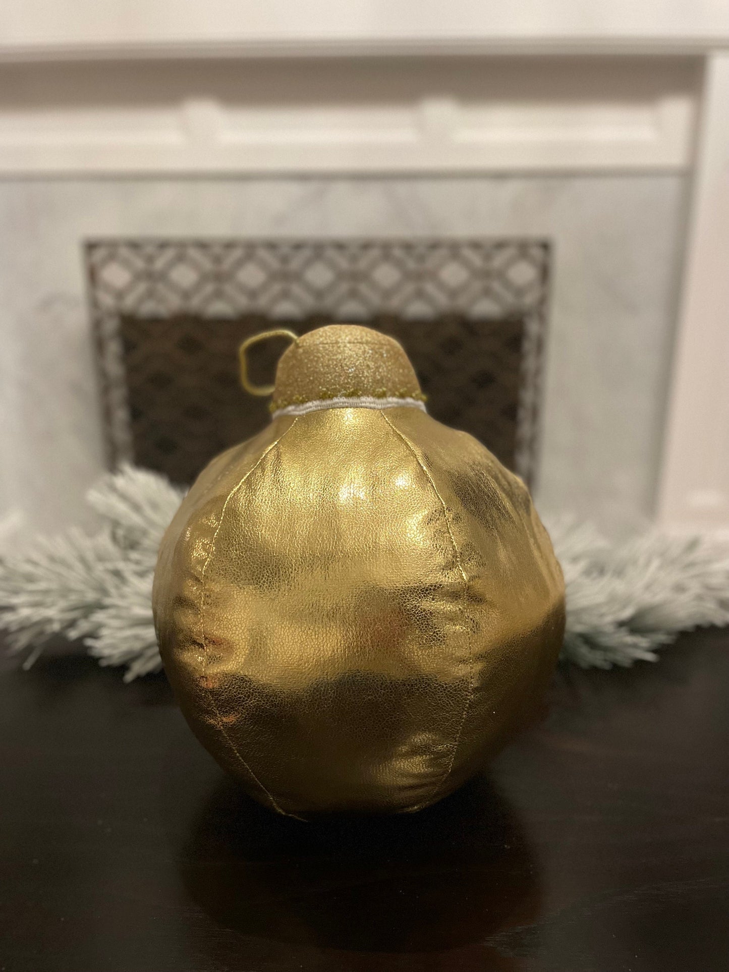 15” H x 10” W gold tabletop ornament/ under the tree ornament.