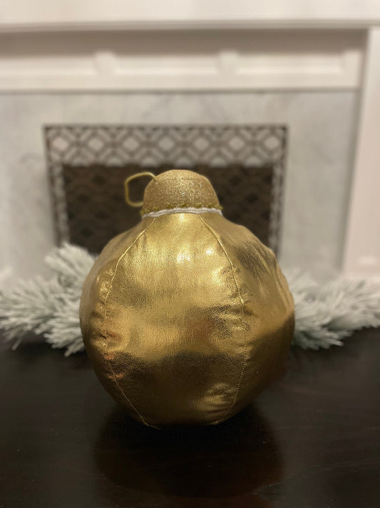 15” H x 10” W gold tabletop ornament/ under the tree ornament.