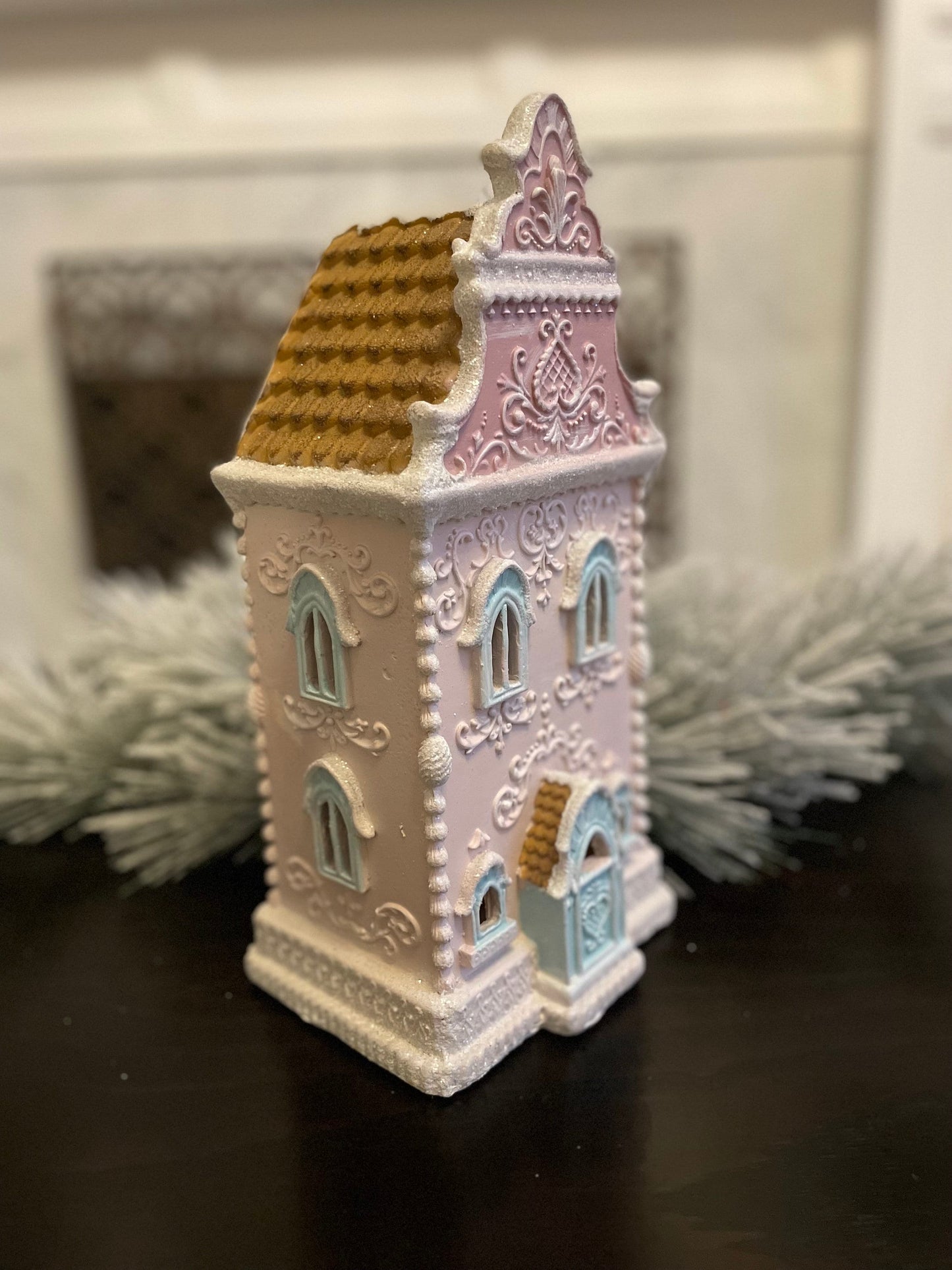 13” Gingerbread lighted house. Pastel pink and blue.